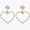 Caroline Svedbom Baguette Heart Örhängen/ Crystal (Guld)