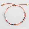Syster P Code Armband Guld JUST BREATHE