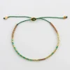 Syster P Code Armband Guld GOOD VIBES