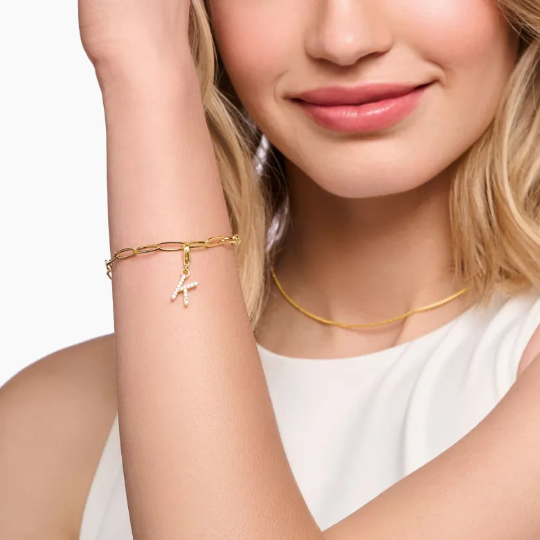 Thomas Sabo Charm-hängsmycke bokstaven K med vita stenar guldpläterad